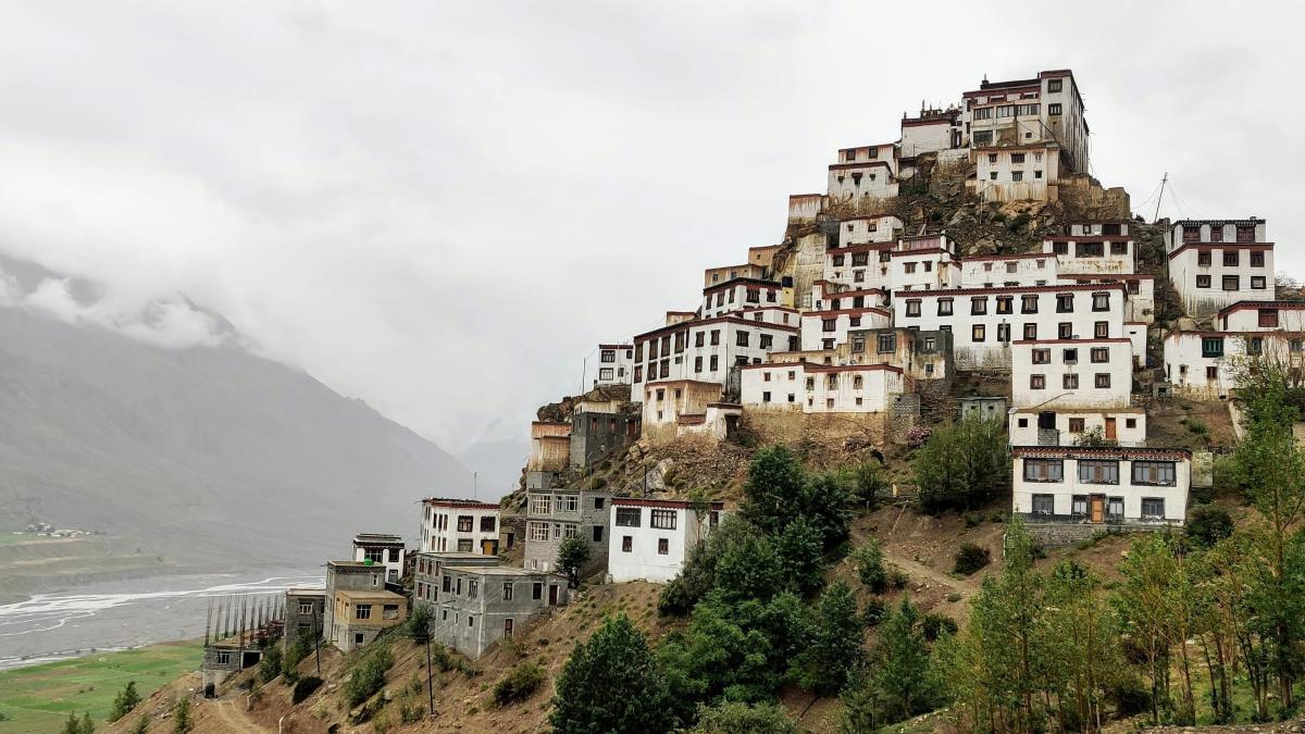 a mountain with a bunch of buildings on top of it