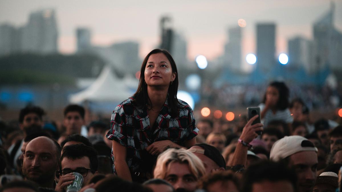 a person standing in a crowd
