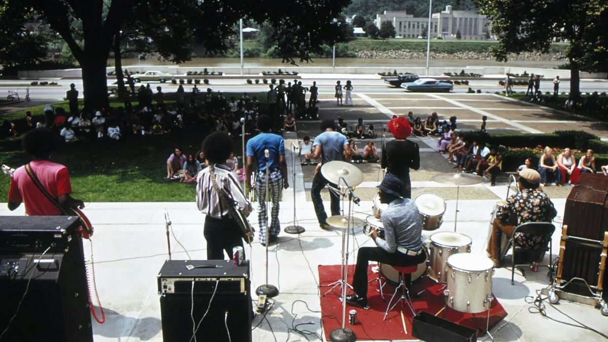 a group of people playing instruments