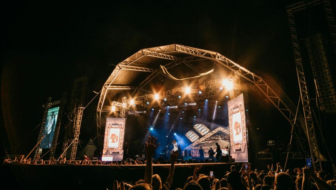 band playing on stage at night