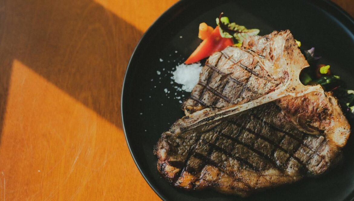 grilled meat on black plate
