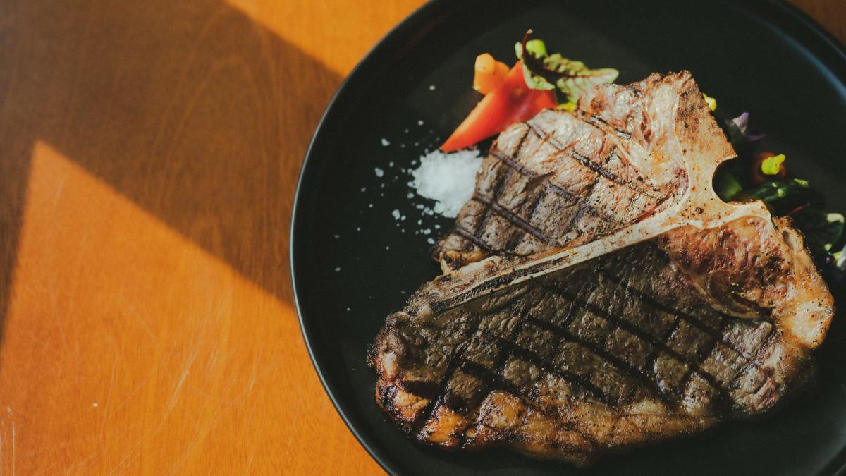 grilled meat on black plate