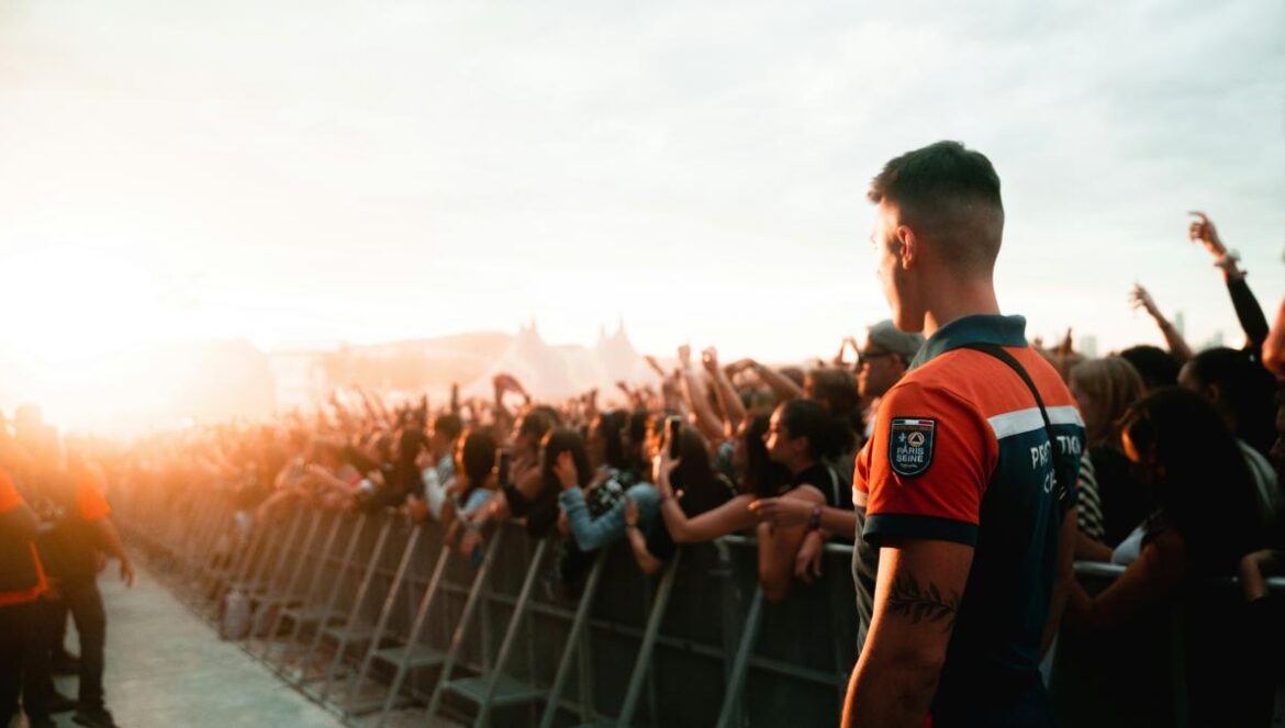 a man standing in front of a crowd of people