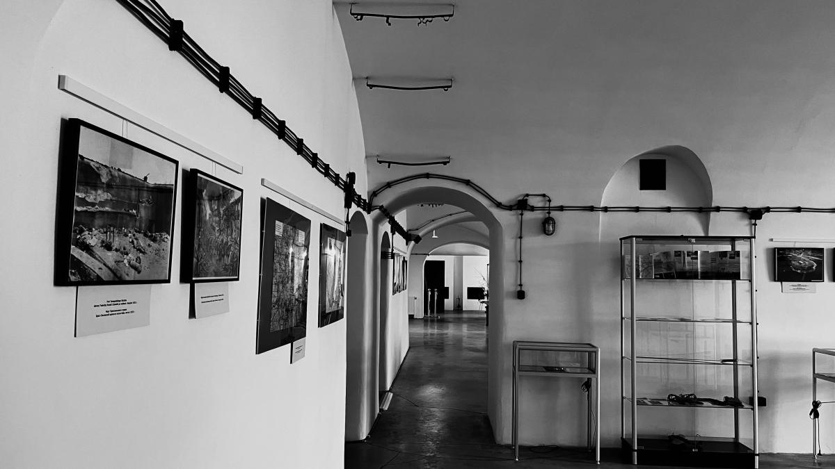 a black and white photo of a hallway