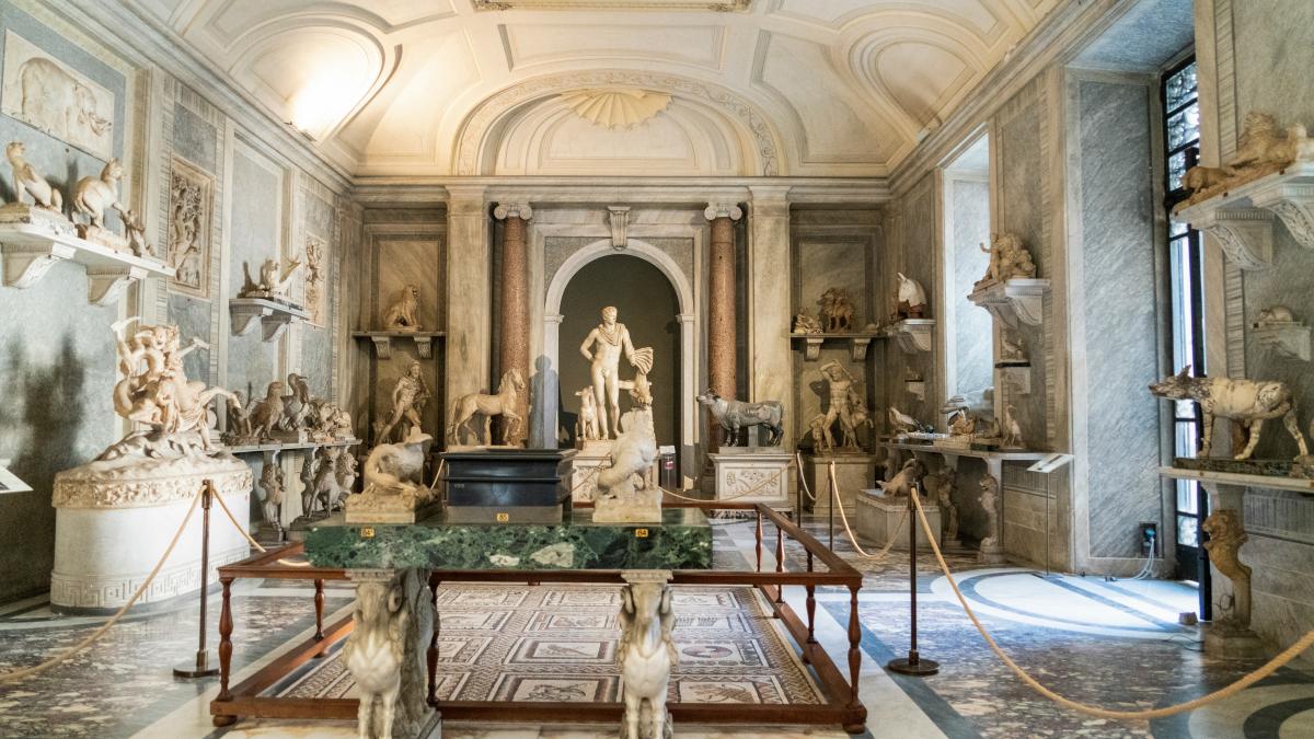 a room with statues and a table