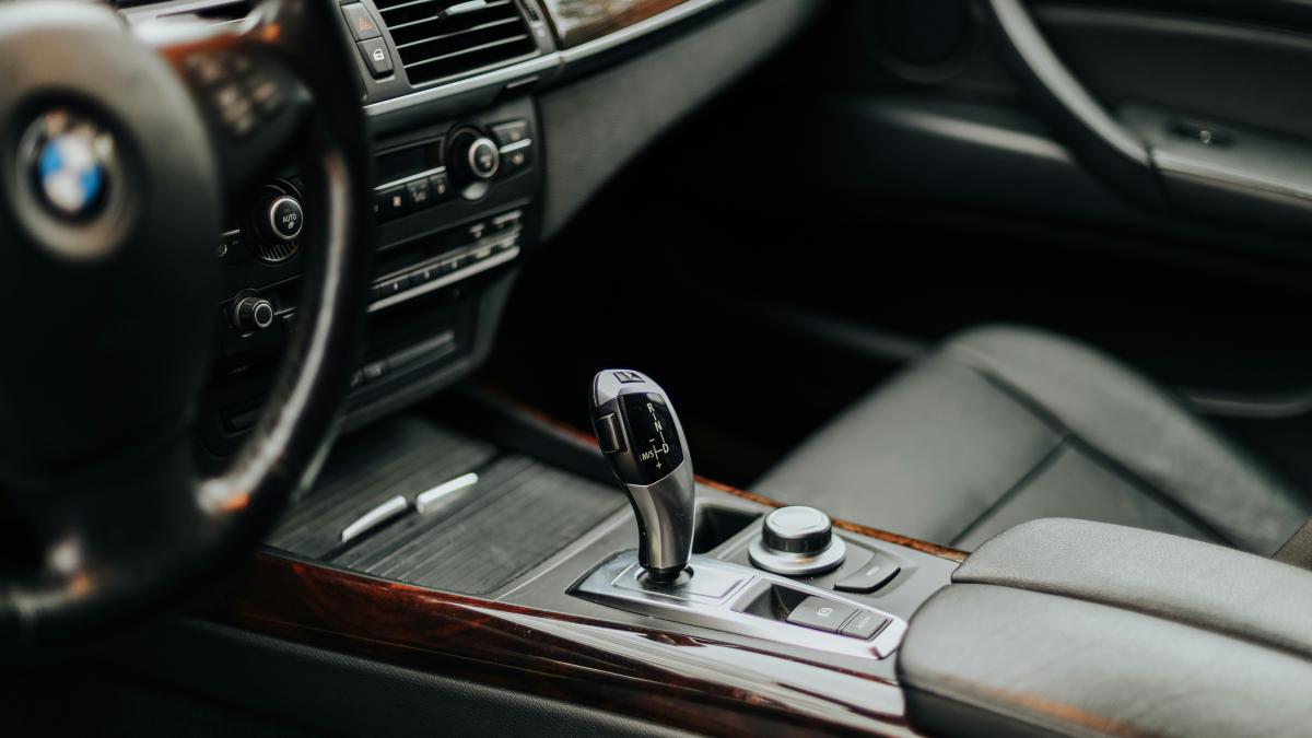 the interior of a car with a steering wheel