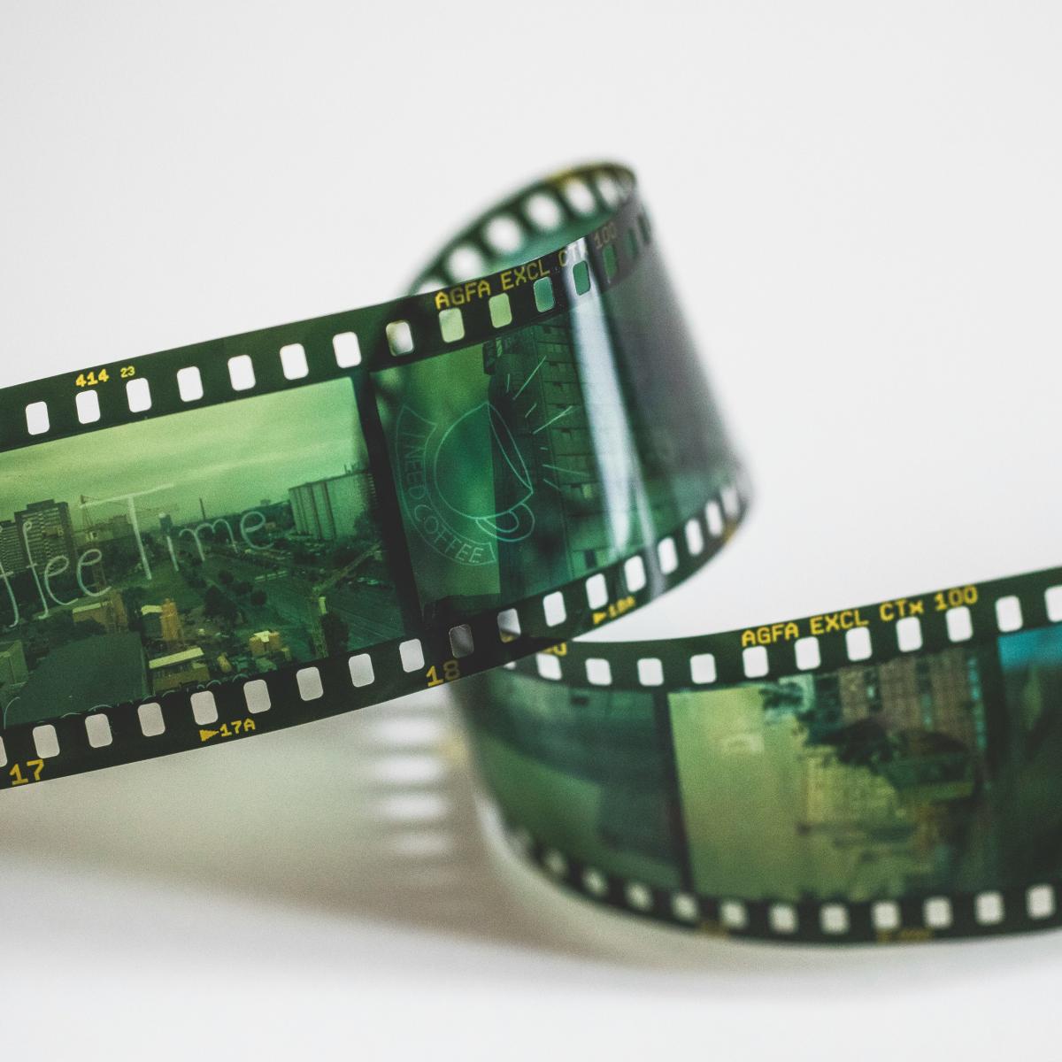 green and black framed eyeglasses