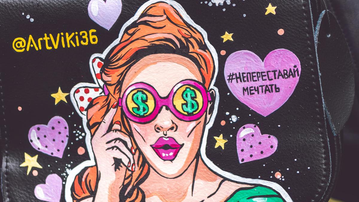 woman illustration on black leather bag