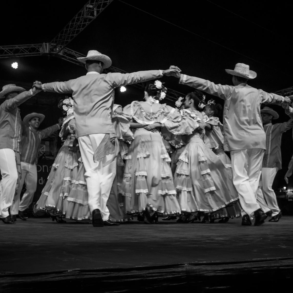 A group of people standing on top of a stage
